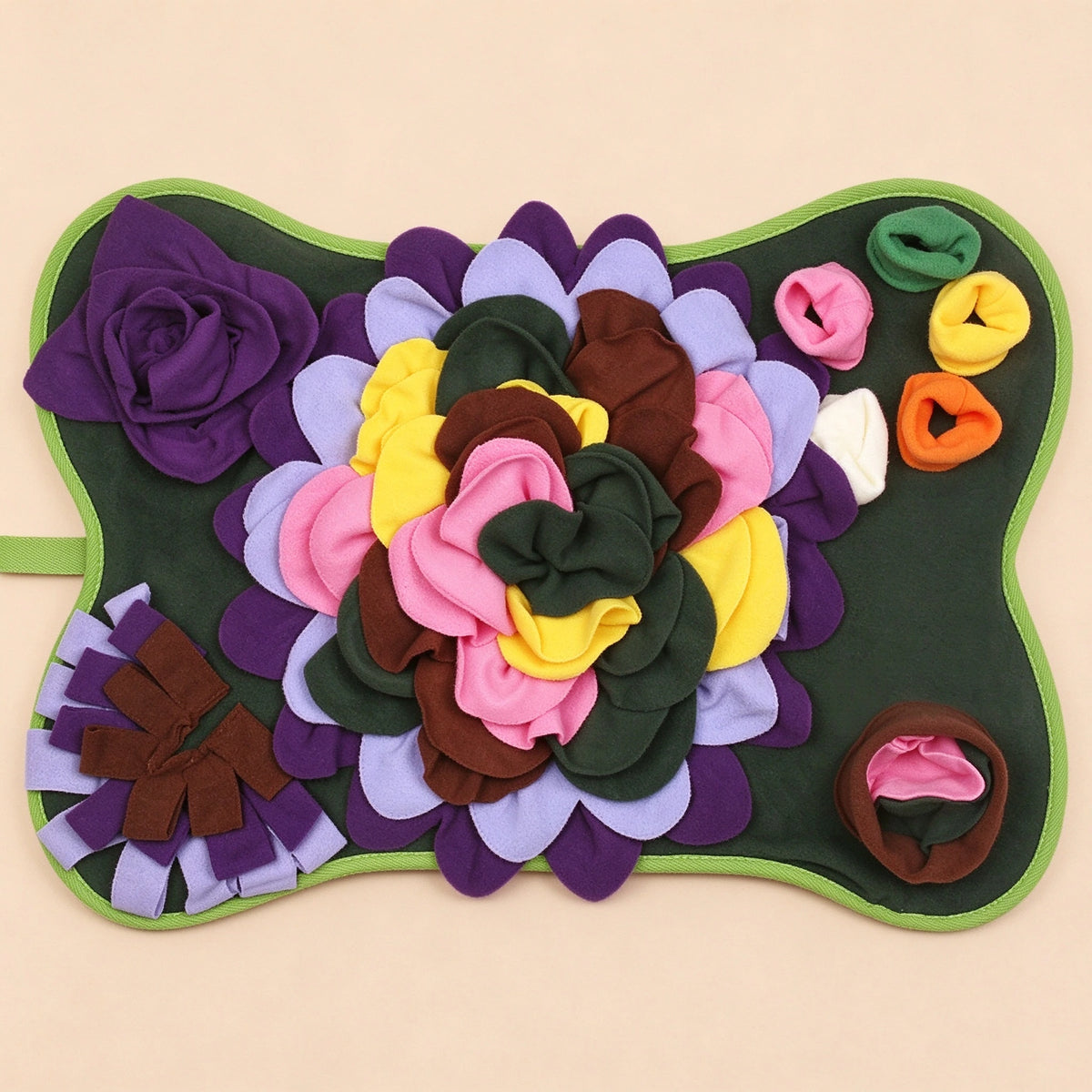 Clean product shot of the flower snuffle mat on beige background, no text